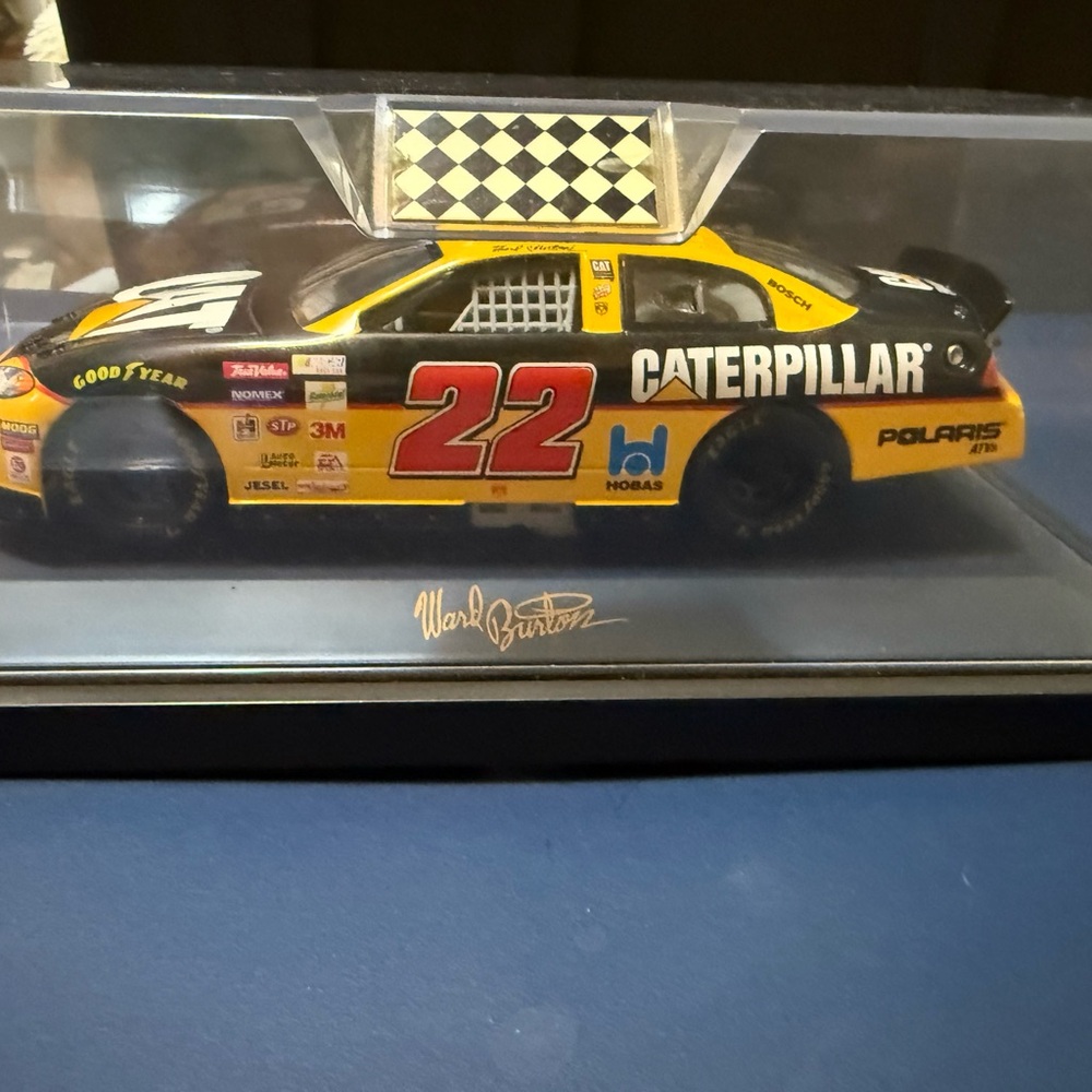 #22 Ward Burton Caterpillar Diecast Car with Red and Yellow Accents